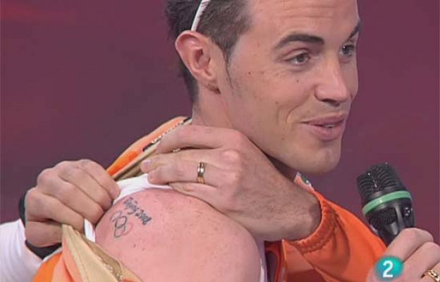 Vuelta ciclista a España - Samu enseña los aros olímpicos