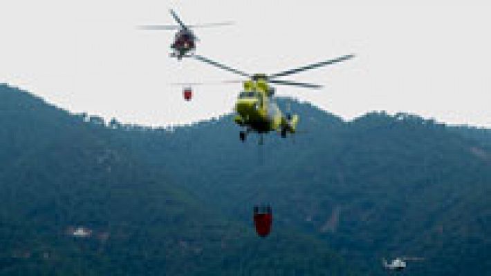 Telediario 1 - La lluvia y la bajada de las temperaturas ayudan a la extinción del incendio de Artana, en Castellón