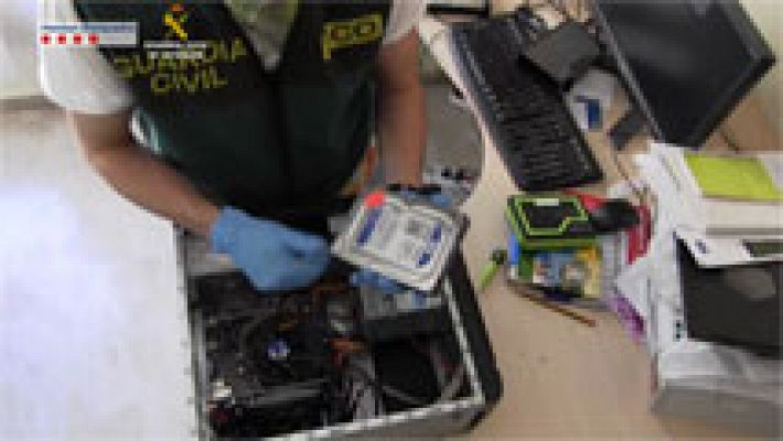 Telediario 1 - La Guardia Civil y los Mossos d'Esquadra desarticulan al grupo de pederastas más activo de España