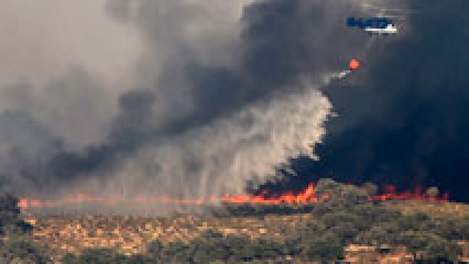 Telediario 1: El incendio de El Castillo de las Guardias, en Sevilla, sigue sin control tras haber quemado 1.500 hectáreas | RTVE Play