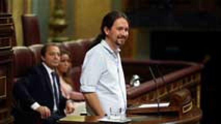Telediario 1 - Rajoy e Iglesias protagonizan un debate cargado de reproches e ironía