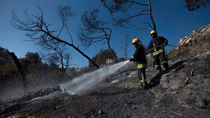 Telediario 1 - Los incendios obligan a desalojar a decenas de miles de personas en Israel
