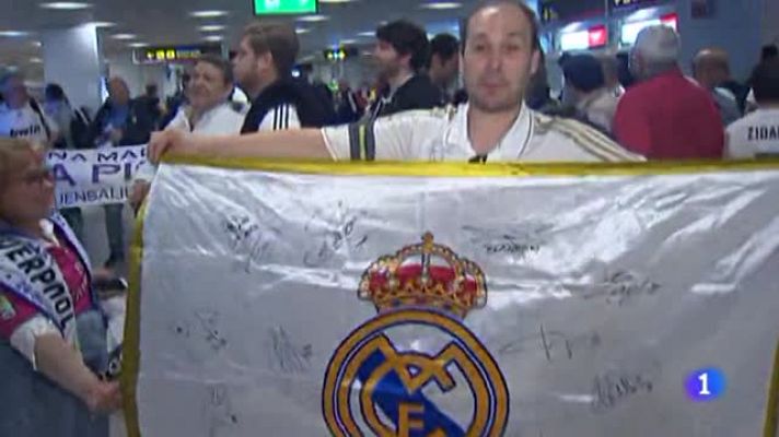 Telediario 1 - Los aficionados merengues inician la odisea en Barajas