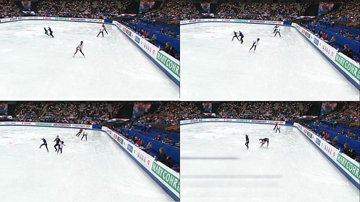 Patinaje sobre hielo - Un patinador italiano y una francesa chocan en el calentamiento
