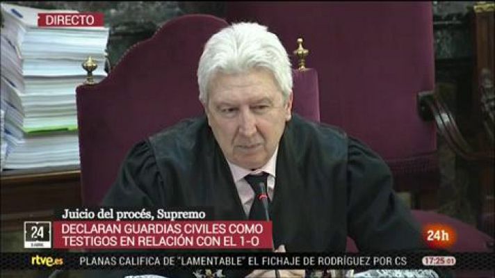 Informativo 24h - Un guardia civil del 1-O asegura que uno de los concentrados le intentó arrebatar el arma reglamentaria