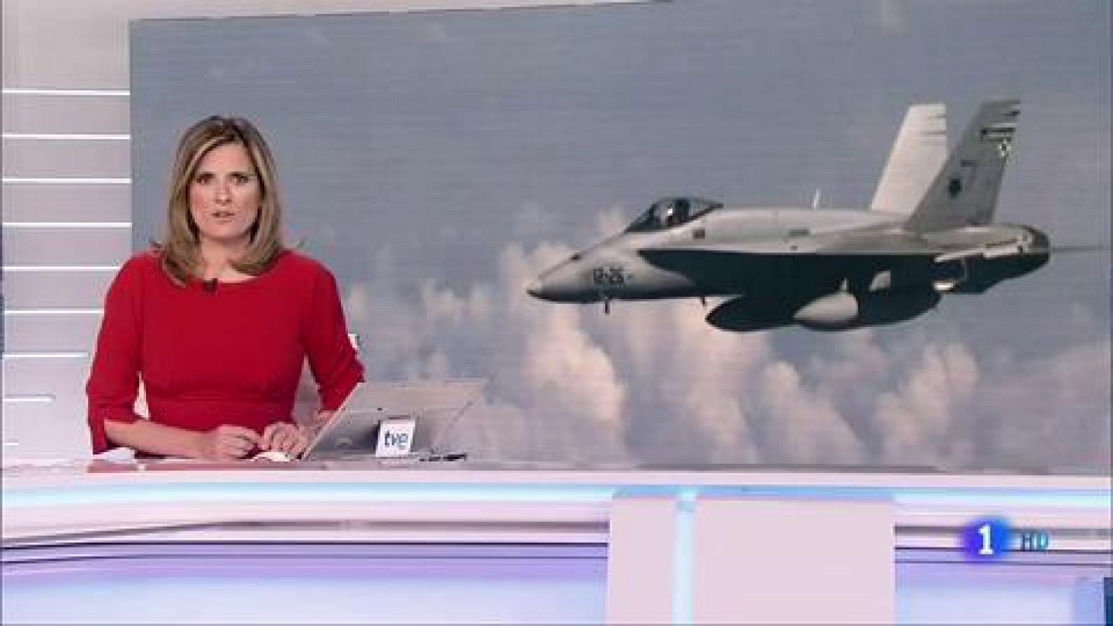 Telediario 1: Moscú asegura haber interceptado un F-18 de la OTAN que se acercó al avión del ministro de Defensa ruso | RTVE Play