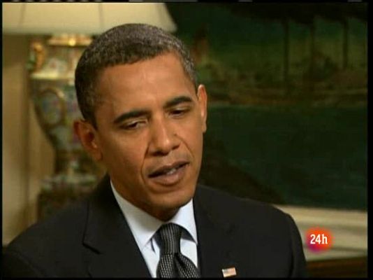  - Obama escucha a Michael Jackson