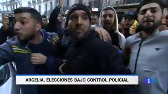 Telediario 1 - La policía de Argelia deja varios heridos y detenidos al disolver las protestas contra las elecciones presidenciales