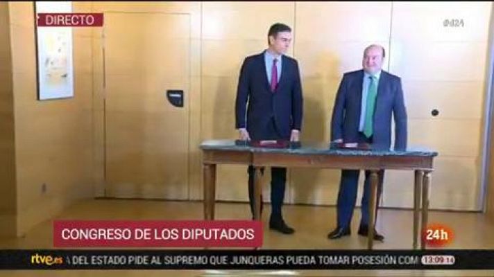 Sánchez y Ortuzar firman el acuerdo de investidura