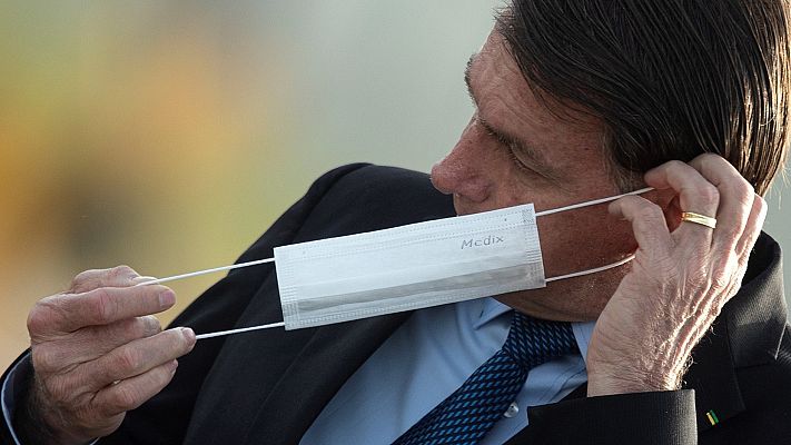 Telediario Internacional - Bolsonaro será denunciado por quitarse la mascarilla ante los periodistas