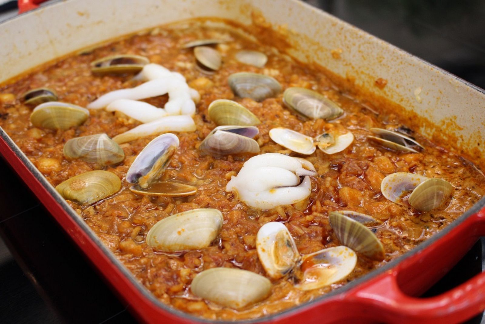 Arroz con sepia y coquinas