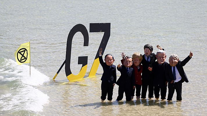 Grupos ecologistas y antiglobalización reivindican la lucha contra el cambio climático y vacunas para todos durante la cumbre del G7