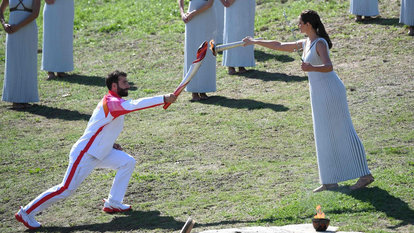 Protestas activistas en el encendido de la llama olímpica para Beijing 2022