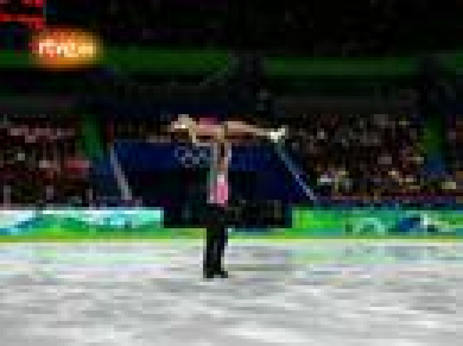   Los patinadores chinos Xue Shen y Hongbo Zhao terminaron en primera posición tras el programa corto en los Juegos de Vancouver 2010