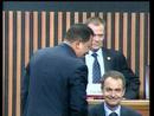 Frío saludo de Chávez a Zapatero