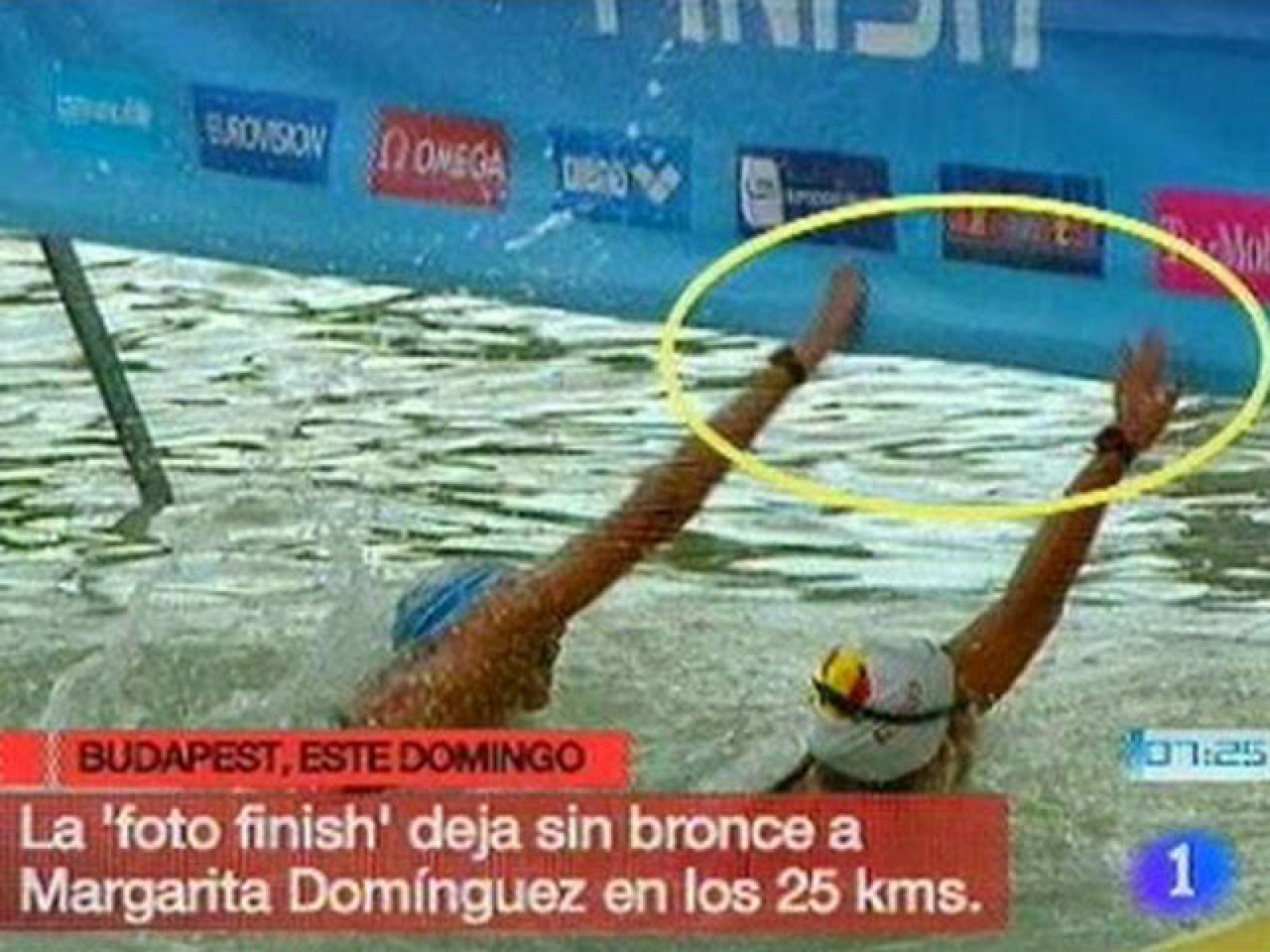 La nadadora española Margarita Domínguez se ha quedado con la miel en los labios en la prueba de 25 kilómetros de la competición de aguas abiertas de los Campeonatos de Europa de Natación, que se están disputando en Budapest hasta el 15 de agosto, al perder la medalla de bronce en la 'foto-finish'.