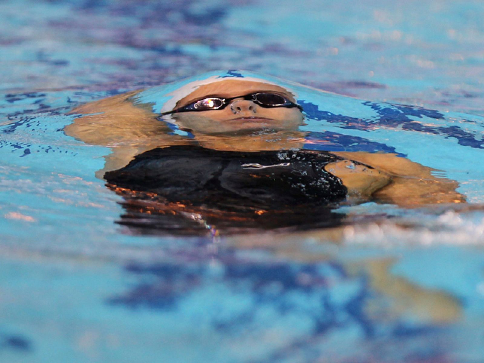 La nadadora española Merche Peris logró la medalla de bronce en la prueba de 50 espalda del Mundial de Natación que se celebra en Dubai, con un tiempo de 26.8, por detrás de la china Jing Zhao y de la australiana Rachel Goh.